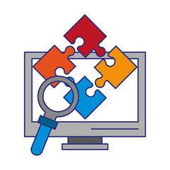 computer puzzle and magnifying glass