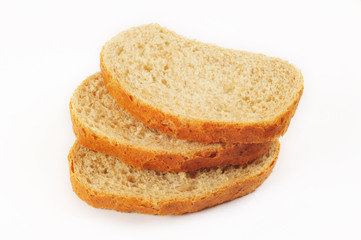 Slices of bread with bran on white background