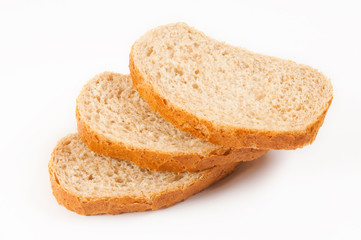 Slices of bread with bran on white background