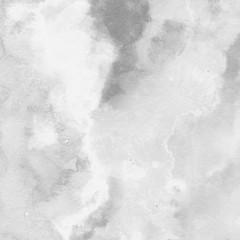 Silver with gray ink and watercolor texture on white paper background. Paint leaks and ombre effects. Hand painted abstract image.