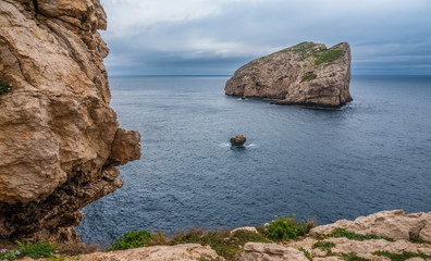 Capo Caccia, a rocky outcrop set in a protected ecosystem near the town of Alghero, Sardinia,...