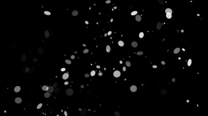 First falling snow bokeh texture on black background. Winter texture.Design element.