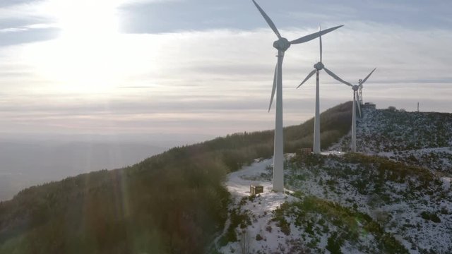 Wind turbines producing clean and sustainable energy aerial view