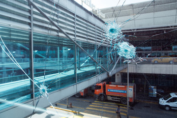 Bullet hole in glass.