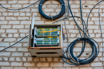 Fiber Optic Patch Panel On Apartment Building Wall