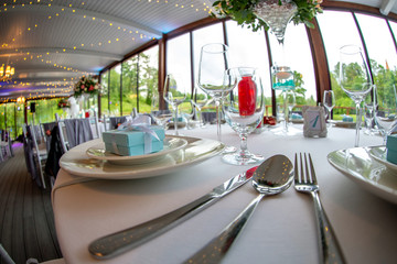 Table setting for wedding party in restaurant