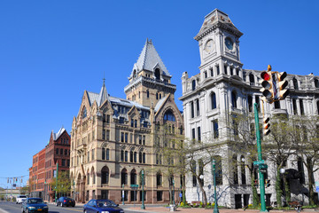 Syracuse savings Bank Building (left) and Gridley Building (right) at Clinton Square in downtown Syracuse, New York State, USA. Syracuse Savings Bank Building was built in 1876 with Gothic style.