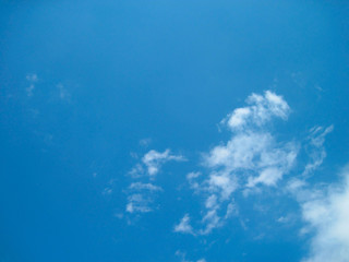 Naklejka na ściany i meble Blue sky with white clouds. Clear day time view background