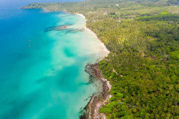 Aerial view. Beautiful tropical beach and wooden bridge in the sea in island Koh Kood Thailand