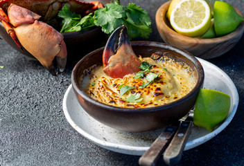  CHILEAN FOOD.  Baked crabmeat crab meat with cheese, cream and bread.  Traditional dish of chilean coast. Pastel o chupe de jaiba.