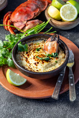  CHILEAN FOOD.  Baked crabmeat crab meat with cheese, cream and bread.  Traditional dish of chilean coast. Pastel o chupe de jaiba.
