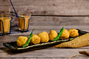 Potato Wada, Batata Vada a popular vegetarian fast food in Maharashtra,It literally means potato...