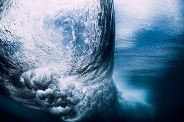 Fototapeta premium Barrel wave underwater with air bubbles. Ocean in underwater