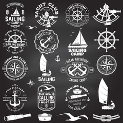 Set of sailing camp and yacht club badge. Vector. Concept for shirt, print or tee. Vintage typography design with black sea anchors, hand wheel, compass and sextant silhouette.