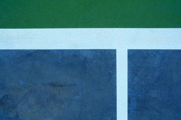 Fototapeta na wymiar Close up White Line of Green Tennis Training Wall Background.