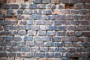 wall of old dilapidated brick crack old house