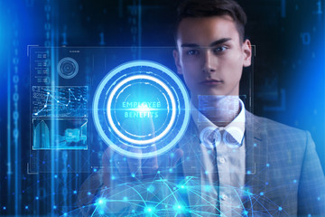 The concept of business, technology, the Internet and the network. A young entrepreneur working on a virtual screen of the future and sees the inscription: Employee benefits
