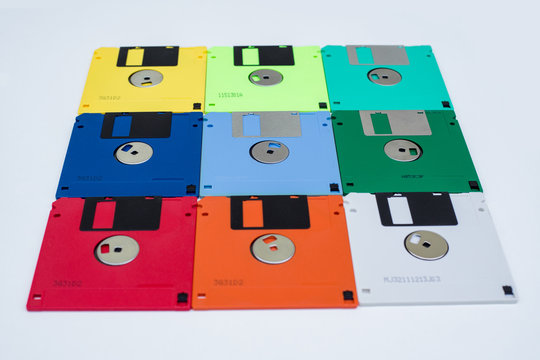 Multi colored 3.5 floppy disks in foreshortening