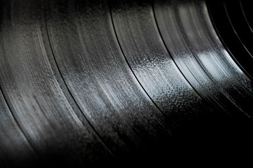 Surface of an old vinyl record. Macro shot, shallow depth of field. SDF.