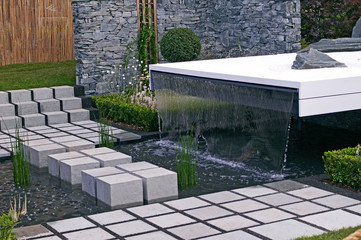 The contemporary water feature in the East meets West garden