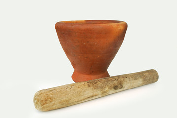 Thai clay mortar for the famous Thai Som Tam salad on white background.(with Clipping Path).