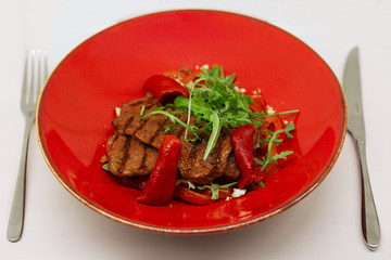 Meat steak greens and peppers