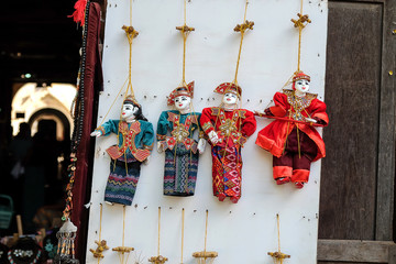 String Puppet souvenir, Colorful Myanmar (Burma) tradition dolls in the Archaeological Zone Bagan,...