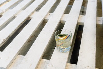 tasty drink on wooden white table, rustic beach cafe , summer vacation concept