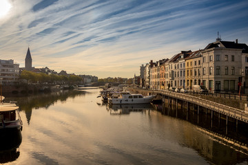Cityscape. The streets of old Ghent, with bicycles, channels and beautiful houses. Belgium October 15, 2018