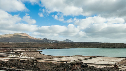 Sunset at Salinas de Janubio. Old salt pans in the south of Lanzarote were they harvest salt the traditional way