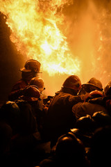 Fototapeta na wymiar firefighters fight against fire burning 