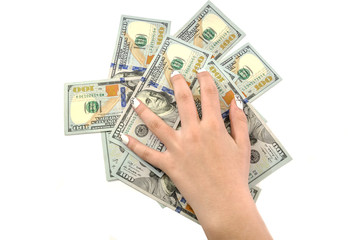 Hand on dollars, top view. White background.