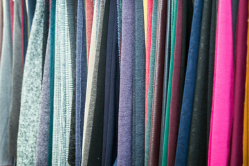 different textures and colors of textile fabrics on display in the store, Studio, etc.