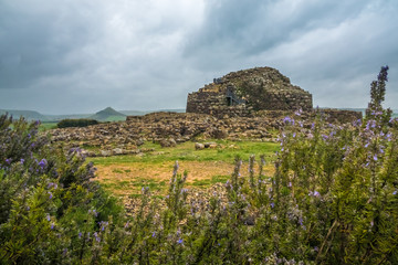 Su Nuraxi is a nuragic archaeological site in Barumini, Sardinia, Italy. Among thousands of ancient megalithic structures built during the Nuragic Age between 1900 and 730 B.C.