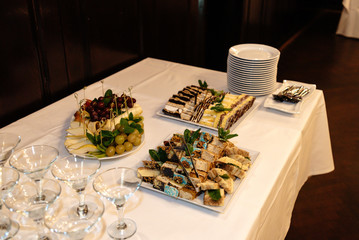 luxury decorated buffet table with martini glasses, catering in restaurant