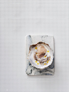 Oyster with oils and milk