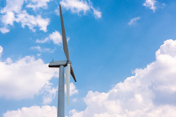 Windmill Turbine of Electric Power at Offshore Farm on Blue Sky Background, Renewable Green Energy From Natural Resources for Sustainable. Windmill Renewable Electricity for Energy Sustainability