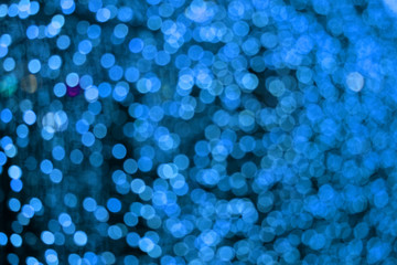 blue color abstract of blur and bokeh colorful light interior and night garden