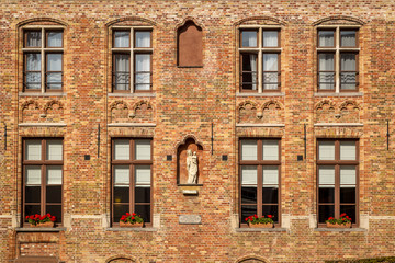 Straight view of the red brick building in Bruges, Belgium