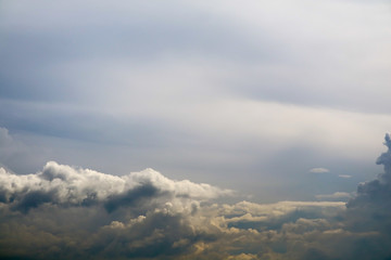 Fototapeta na wymiar storm silhouette cloud sun in gray sky dark cloud
