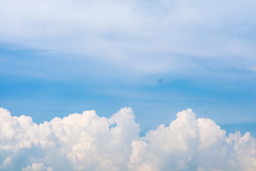 white huge heap cloud sunshine in summer blue sky soft cloud