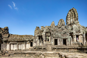 Fototapeta premium Beautiful face sculptures at the famous Bayon temple in the Angkor Thom temple complex, Siem Reap, Cambodia