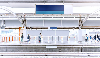 train station platform with blank billboard advertising
