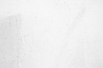 Fototapeta premium Unfinished White Painting on Concrete Wall Texture Background.