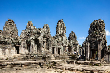 Naklejka premium Beautiful face sculptures at the famous Bayon temple in the Angkor Thom temple complex, Siem Reap, Cambodia