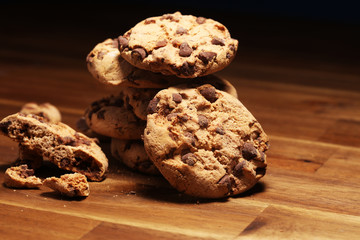 Chocolate cookies on wooden table. Chocolate chip cookies