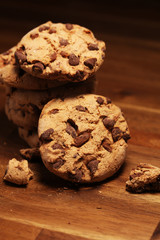 Chocolate cookies on wooden table. Chocolate chip cookies