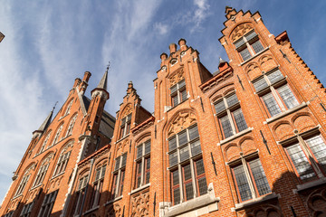 Building of Provincial Court in Bruges. View from bottom to red brick building