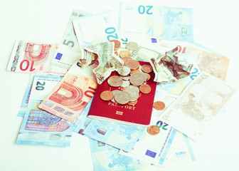 Cash on table isolated: dollars, euro, rubl broken money. All in mess, global crisis . passport travel concept