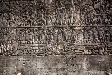 Bas reliefs at Bayon temple depicting the battles between Khmers and their traditional enemies the Chams, Angkor Thom, Siem Reap, Cambodia
